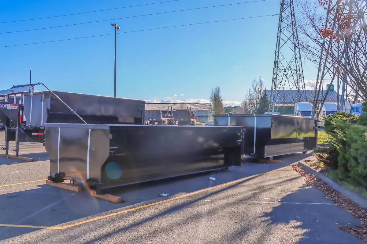 Roll-off dumpster ready for waste disposal at job site for Concrete Dumpster Rental in Shawnee